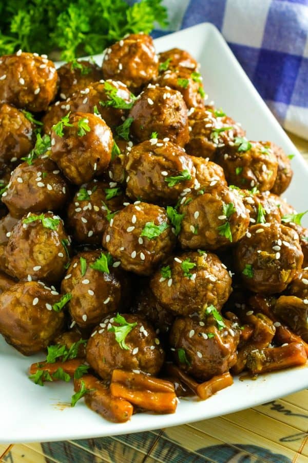  Slow Cooker Asian Barbecue Meatballs with frozen meatballs, vegetables, teriyaki sauce, barbecue sauce and sriracha are just what you need to make these sweet and spicy meatballs. 