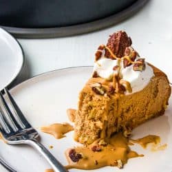 Easy Low Carb Pumpkin Spice Cheesecake is an almond flour crust topped with rich pumpkin spiced filling. It’s a great make ahead dessert for a low carb Thanksgiving!