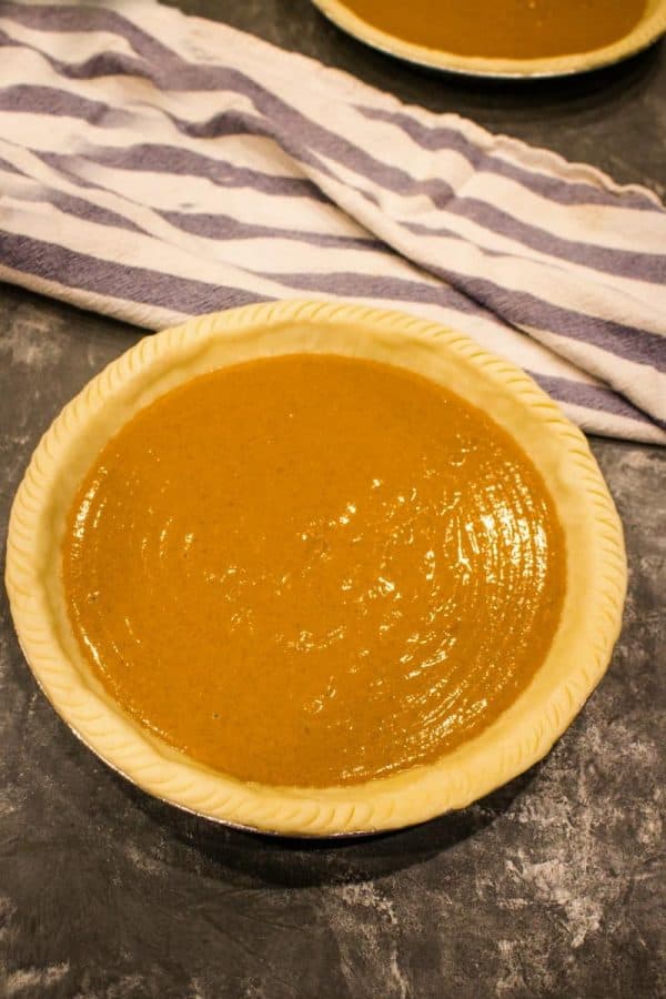 Make ahead pumpkin pie ready for the oven.