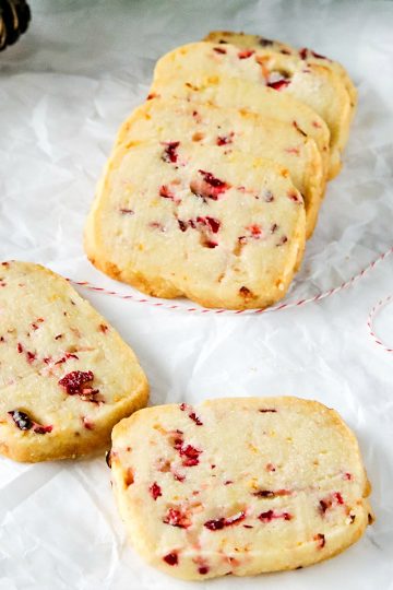 Make buttery, zesty Cranberry Citrus Shortbread Cookies with basic pantry ingredients. Boldly flavored slice & bake cookies for your festive dessert table!