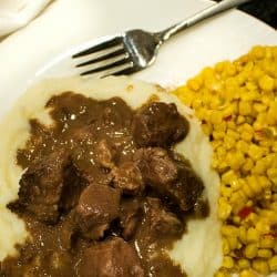 Freezer Meal Beef and Gravy - economical cubed chuck roast made with tasty onion and mushroom gravy. It's a perfect no-fuss meal.
