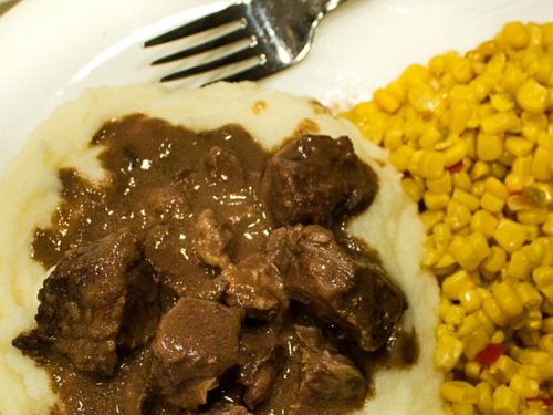 Freezer Meal Beef and Gravy - economical cubed chuck roast made with tasty onion and mushroom gravy. It's a perfect no-fuss meal.