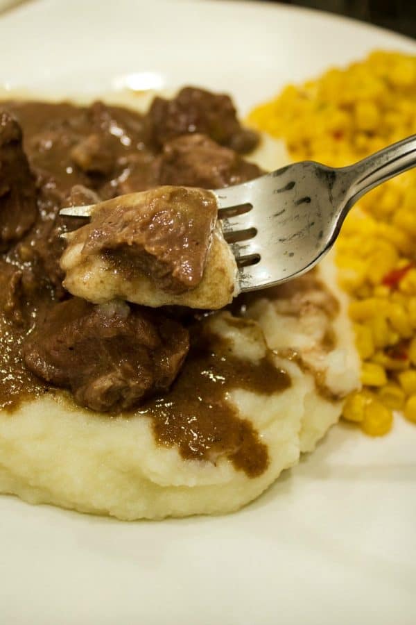 Freezer Meal Beef and Gravy - economical cubed chuck roast made with tasty onion and mushroom gravy. It's a perfect no-fuss meal. 