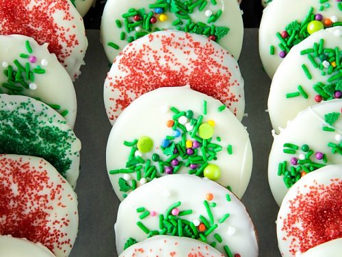 White Chocolate Gingerbread Crisps - thin gingerbread wafers, flavored with brown sugar, molasses and spices, covered with white chocolate and decorated with festive sprinkles. Merry and bright for the holidays!