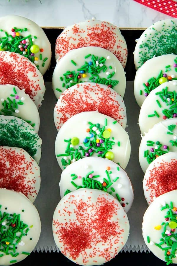 White Chocolate Gingerbread Crisps - thin gingerbread wafers, flavored with brown sugar, molasses and spices, covered with white chocolate and decorated with festive sprinkles. Merry and bright for the holidays!