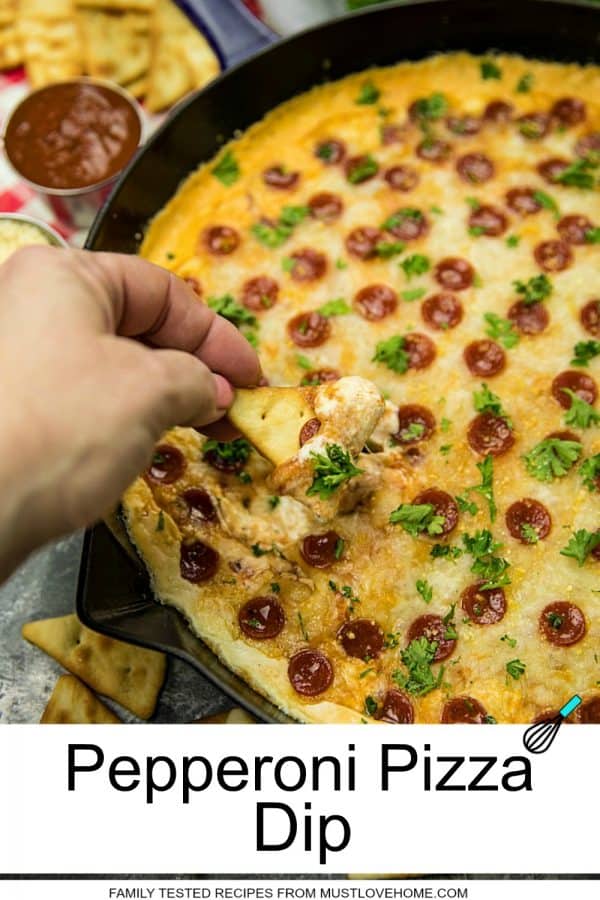 Pepperoni Pizza dip recipe is creamy, cheesy, loaded with spicy pepperoni and totally crave worthy! Serve your pizza dip with pita chips for the ultimate party snack. #mustlovehomecooking