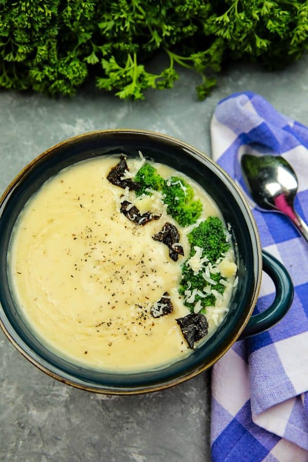 Slow Cooker Alfredo Potato Soup with hearty potatoes, tangy parmesan cheese and a hint of garlic is a cozy bowlful of comfort food ready to warm you on a cold winter night, made easy in the slow cooker.