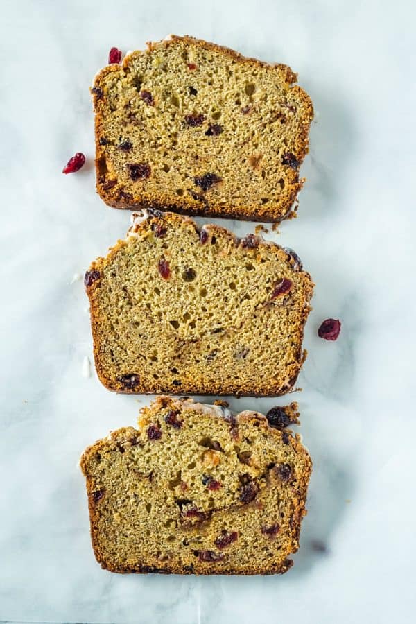 Cranberry Cinnamon Banana Bread - super moist and tender bread with cranberry, cinnamon and yogurt flavors make this delicious loaf perfect for breakfast or dessert!