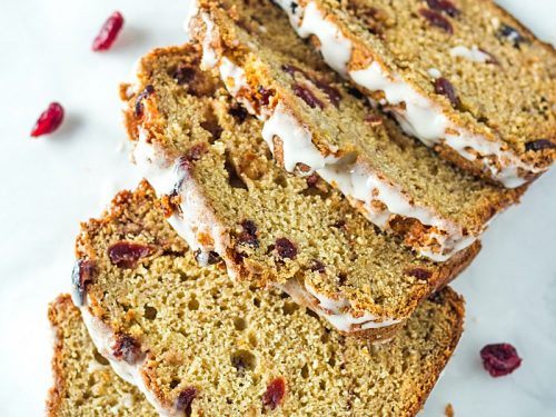 Cranberry Cinnamon Banana Bread - super moist and tender bread with cranberry, cinnamon and yogurt flavors make this delicious loaf perfect for breakfast or dessert! #mustlovehomecooking