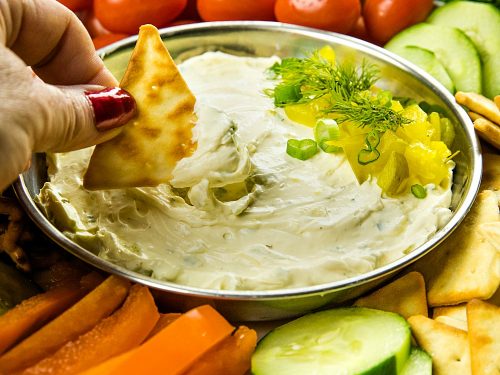 This fun and insanely addictive party pickle dip is made with cream cheese, dill pickles and seasoning and takes only minutes to make.