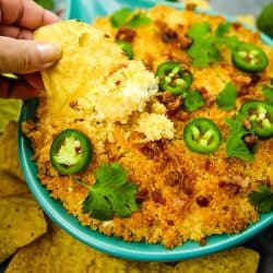 Jalapeno popper dip recipe is fresh, creamy, cheesy and completely addictive! Made with cream cheese, cheddar cheese and fresh jalapenos, then topped with toasted parmesan breadcrumbs. #mustlovehomecooking