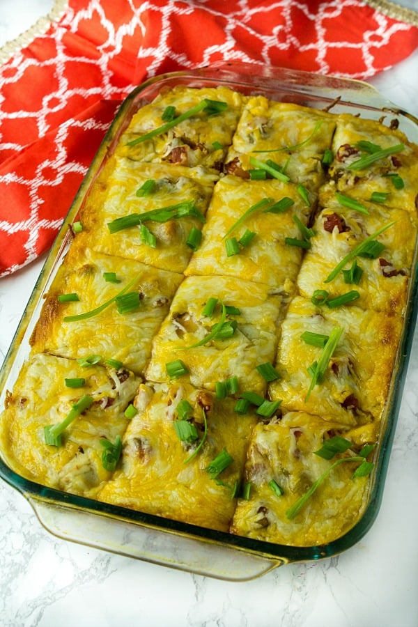 Chicken Taco Casserole is sauce coated tortillas, a zesty mix of chicken, beans, chilies and seasoning, topped with a thick layer of melted cheese. Boldly flavored and simple to make.#mustlovehomecooking #casserole #mexicanfood