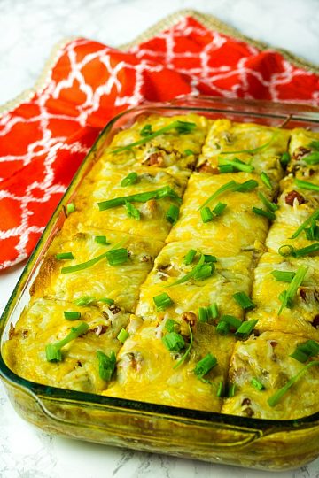 Chicken Taco Casserole is sauce coated tortillas, a zesty mix of chicken, beans, chilies and seasoning, topped with a thick layer of melted cheese. Boldly flavored and simple to make.#mustlovehomecooking #casserole #mexicanfood