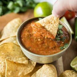 Blackened tomatoes, jalapenos, green onions and olive oil seasoned with lime and honey. It's homemade tomato salsa that's fresh and full of flavor to dip your favorite tortilla chips into. #mustlovehomecooking #salsarecicipe