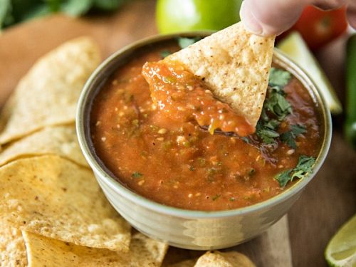 Blackened tomatoes, jalapenos, green onions and olive oil seasoned with lime and honey. It's homemade tomato salsa that's fresh and full of flavor to dip your favorite tortilla chips into. #mustlovehomecooking #salsarecicipe