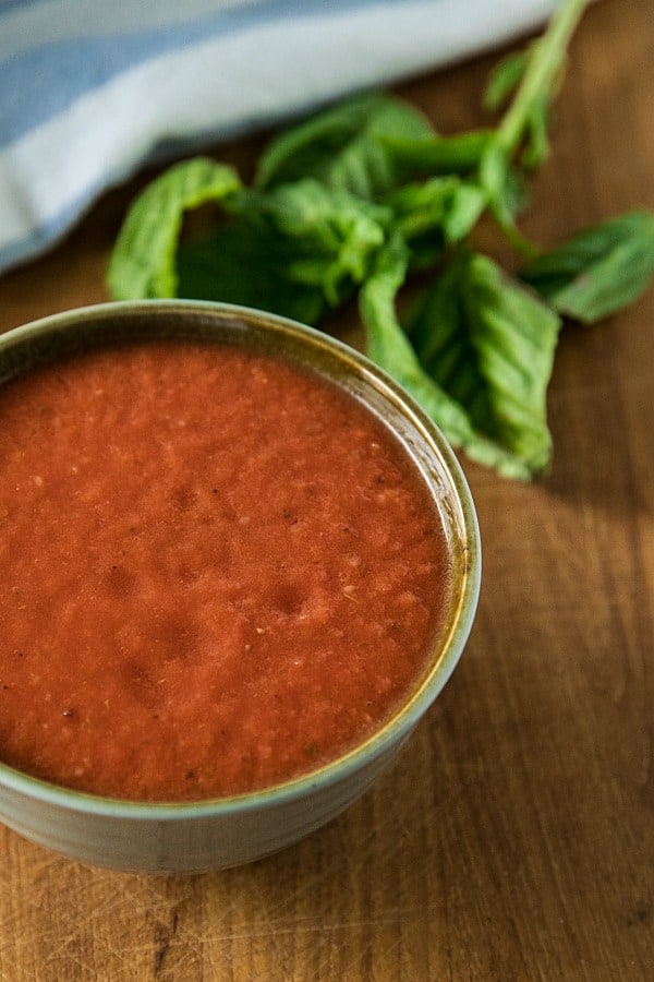 Easy pizza sauce with San Marzano tomatoes, olive oil and seasonings is ready to go in under 5 minutes.#mustlovehomecooking #pizzasaucerecipe