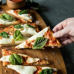 Easy Margherita Flatbread Pizza is a tasty, simple recipe for homemade pizza with flatbread crust, San Marzano pizza sauce, fresh mozarella and basil. #mustlovehomecooking #margheritapizza #pizzarecipes