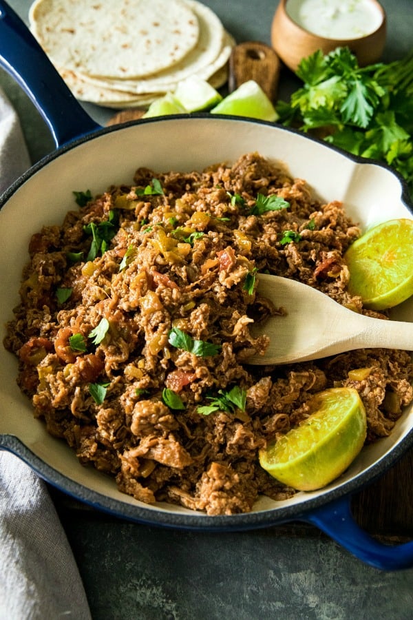 Easy Mexican Beef - tender shaved steak with diced tomatoes and green chilies, seasoned with taco seasoning. Ready to serve in 15 minutes and all in one pan! #mustlovehomecooking #mexicanbeef