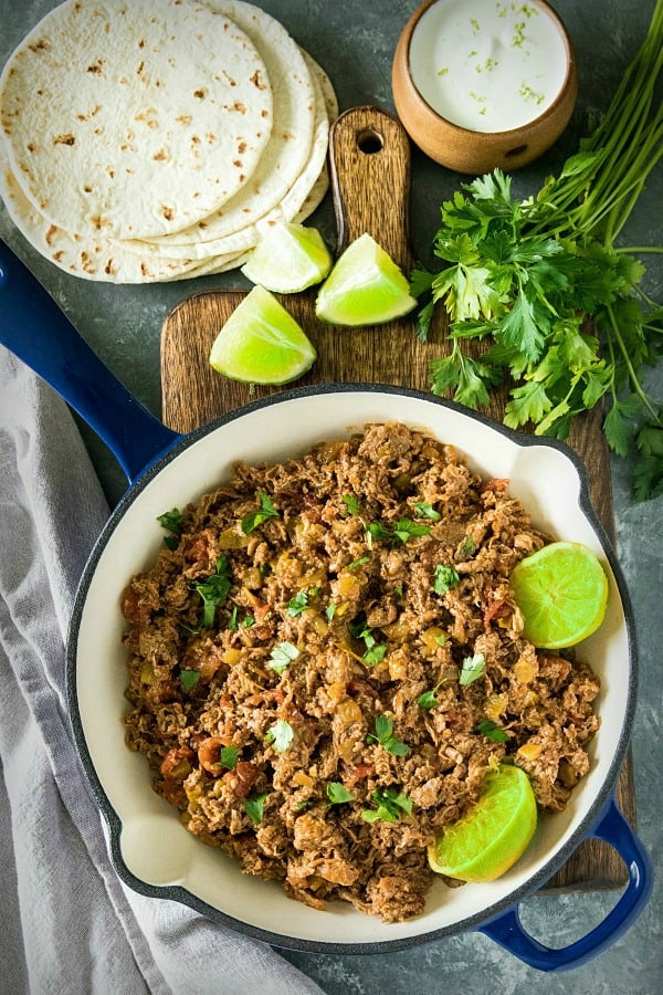 Easy Mexican Beef - tender shaved steak with diced tomatoes and green chilies, seasoned with taco seasoning. Ready to serve in 15 minutes and all in one pan! #mustlovehomecooking #mexicanbeef