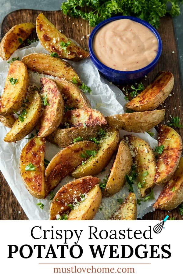 Crispy Roasted Potato Wedges - easy oven baked golden brown potatoes with olive oil, garlic and parmesan cheese. #mustlovehomecooking #ovenpotatorecipes