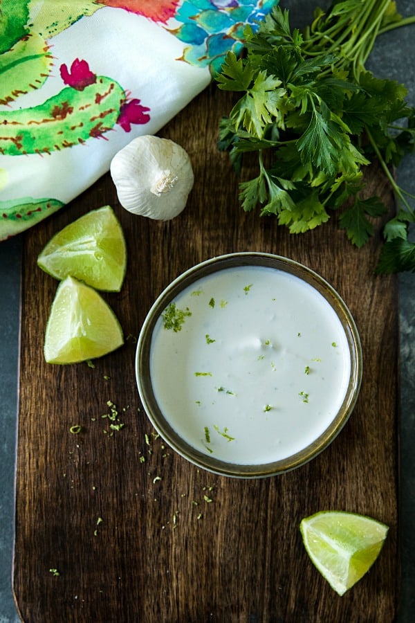 Cool and creamy, this crazy good sour cream and lime sauce adds so much fresh flavor to Southwest dishes with only 3 easy ingredients. #mustlovehomecooking #limecream