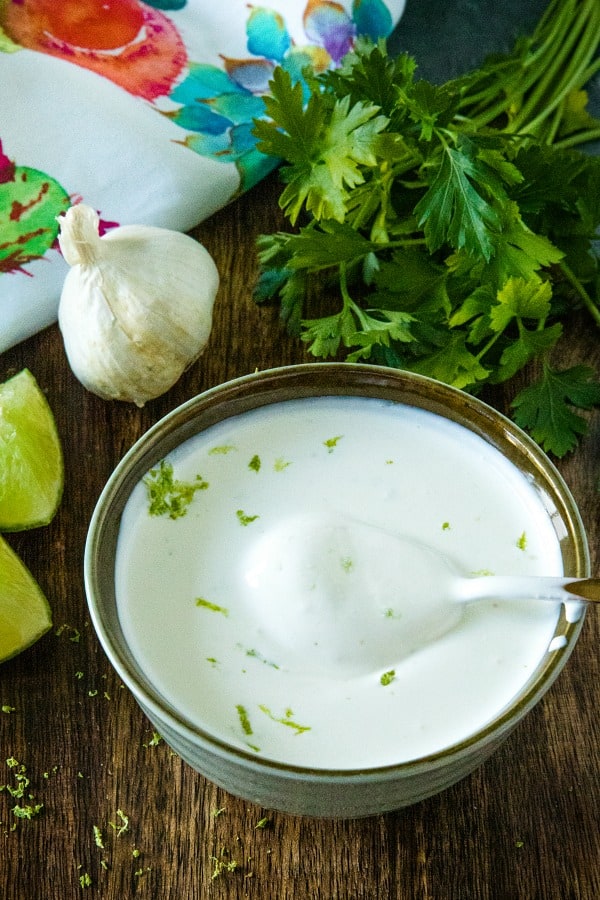 Cool and creamy, this crazy good sour cream and lime sauce adds so much fresh flavor to Southwest dishes with only 3 easy ingredients. #mustlovehomecooking #limecream