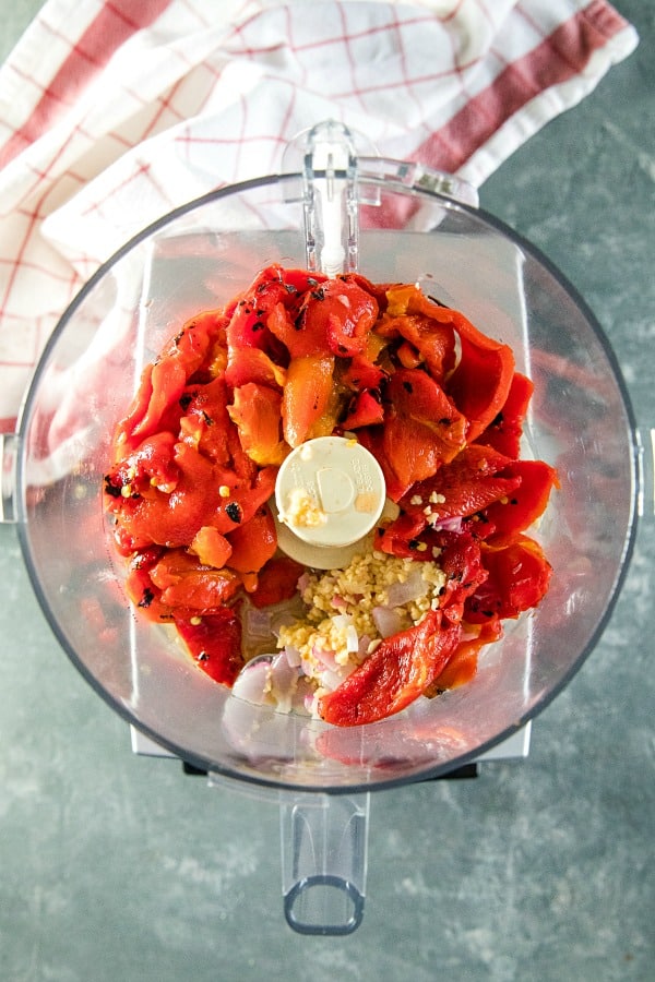 roasted red pepper sauce ingredients in bowl of food processor