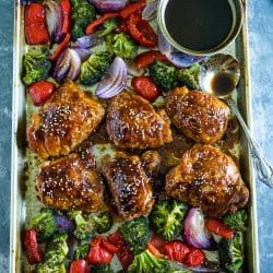 Sheet Pan Sesame Chicken with broccoli, peppers and an addictive tangy sauce. A crave worthy alternative to take-out!#mustlovehome