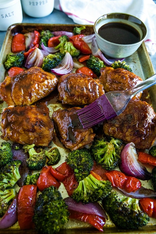 Sheet Pan Sesame Chicken with broccoli, peppers and an addictive tangy sauce. A crave worthy alternative to take-out!#mustlovehome