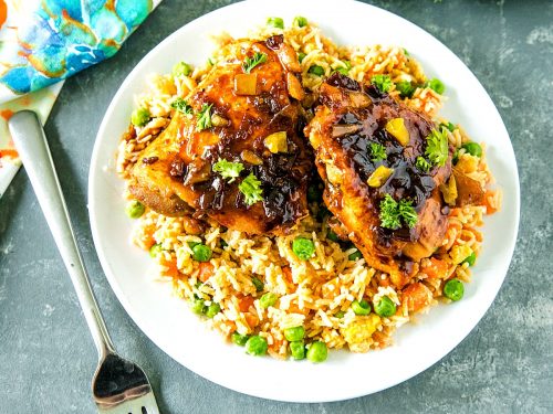 Moist, savory chicken smothered in green chilies and a tantalizingly zesty sauce made with vinegar, soy sauce, brown sugar and spices. #mustlovehomecooking