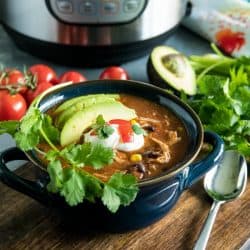 Instant Pot Mexican Chicken Soup with black beans, tomatoes, green chilies and chipotle peppers is a deliciously zesty and comforting meal made quick and easy in your pressure cooker. #mustlovehomecooking