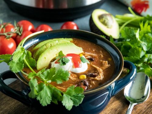 Instant Pot Mexican Chicken Soup with black beans, tomatoes, green chilies and chipotle peppers is a deliciously zesty and comforting meal made quick and easy in your pressure cooker. #mustlovehomecooking