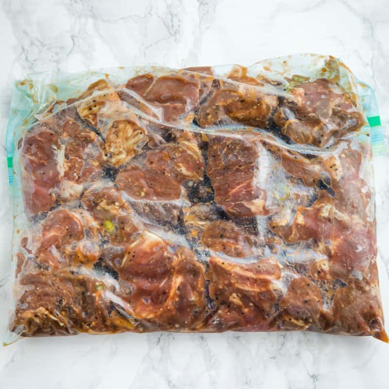 marinating beef chunks in plastic bag