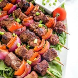 Smoky Chili Beef Shish Kebab with peppers, onions and an amazingly flavorful marinade are perfect for using inexpensive cuts of meat. They're great for grilling or the broiler! #mustlovehomecooking