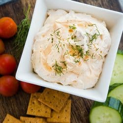 Zesty Dill Ranch Dip is a savory, light dip made with cream cheese and sour cream blended with fresh herbs and ranch seasoning.