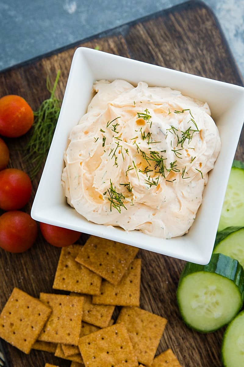 Zesty Dill Ranch Dip is a savory, light dip made with cream cheese and sour cream blended with fresh herbs and ranch seasoning.