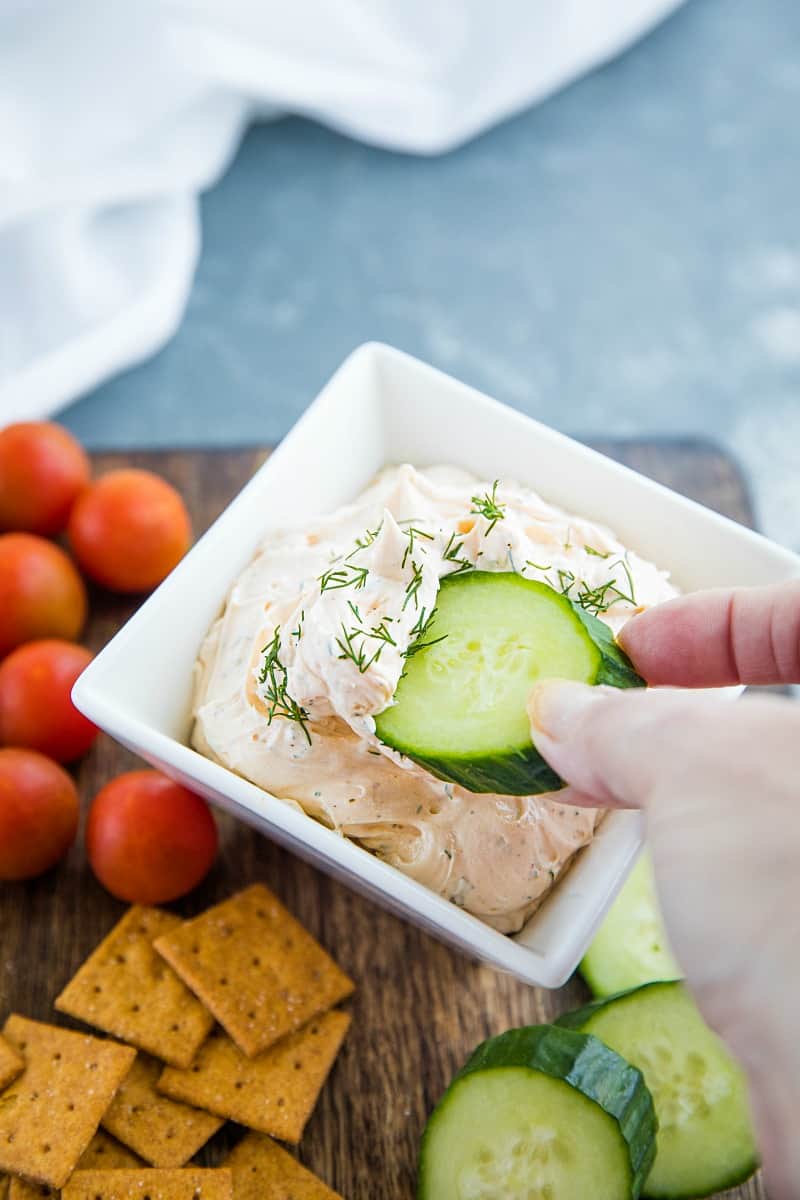 Zesty Dill Ranch Dip is a savory, light dip made with cream cheese and sour cream blended with fresh herbs and ranch seasoning. #mustlovehomecooking