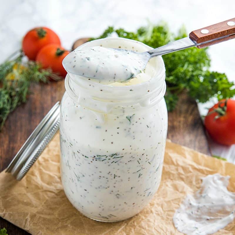 Homemade Buttermilk Herb Dressing with sour cream, mayo, Dijon mustard and lots of fresh herbs is smooth, tangy and full of flavor. This salad dressing is so delicious you'll never settle for bottled again.#mustlovehomecooking