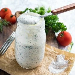 Homemade Buttermilk Herb Dressing with sour cream, mayo, Dijon mustard and lots of fresh herbs is smooth, tangy and full of flavor. This salad dressing is so delicious you'll never settle for bottled again.#mustlovehomecooking