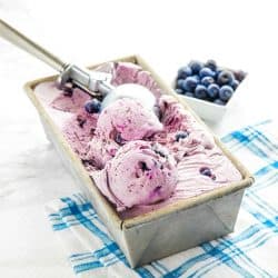 No Churn Cinnamon Blueberry Ice Cream, with fresh blueberries, cinnamon, sweetened condensed milk and cream is a must-have frozen treat that's super easy to make. The smooth flavor will rival any gourmet ice cream. #mustlovehomecooking