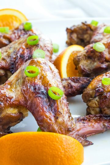 Orange Jerk Chicken Wings are marinated in a zesty homemade blend of orange juice, garlic and spices then baked for a fantastic but oh-so-easy appetizer or meal.