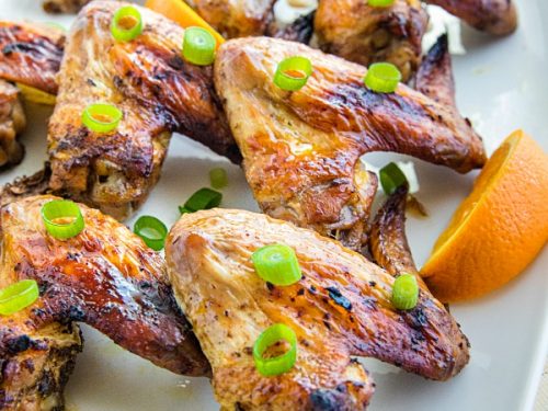 Orange Jerk Chicken Wings are marinated in a zesty homemade blend of orange juice, garlic and spices then baked for a fantastic but oh-so-easy appetizer or meal. #mustlovehomecooking