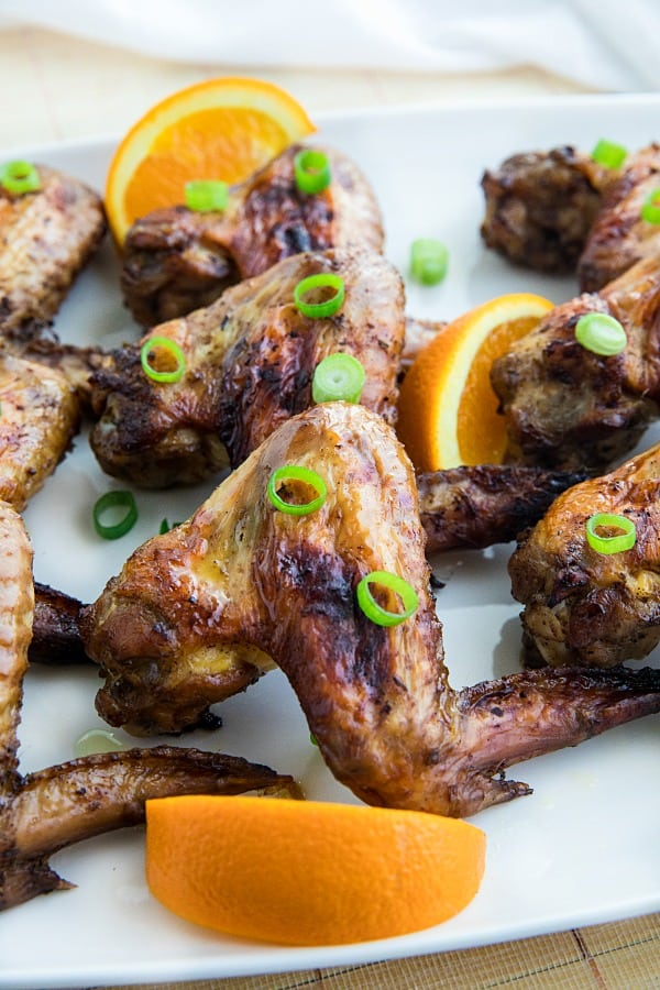 Orange Jerk Chicken Wings are marinated in a zesty homemade blend of orange juice, garlic and spices then baked for a fantastic but oh-so-easy appetizer or meal.