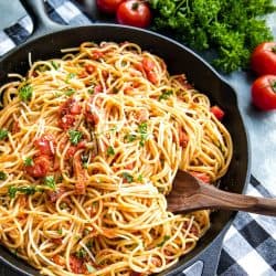 Sun Dried Tomato Puttanesca with tomatoes, anchovies and capers is super fragrant and bursting with flavor...an Italian original made with simple pantry ingredients. #mustlovehomecooking