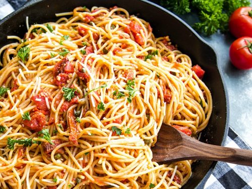 Sun Dried Tomato Puttanesca with tomatoes, anchovies and capers is super fragrant and bursting with flavor...an Italian original made with simple pantry ingredients. #mustlovehomecooking