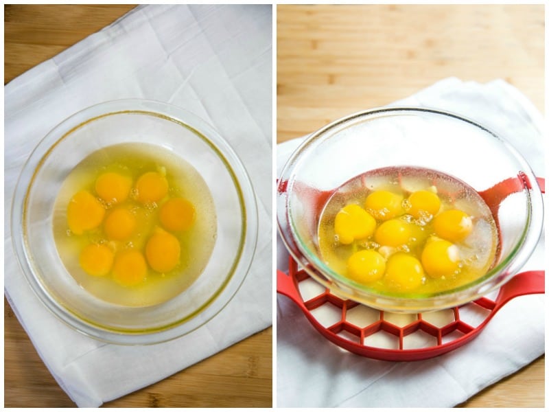 cracked in eggs in a glass mixing bowl with a silicone sleeve