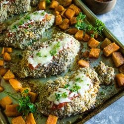 An easy and complete sheet pan dinner of juicy, bread crumb and parmesan cheese crusted pork chops with sweet potatoes baked right alongside. #must5lovehomecooking