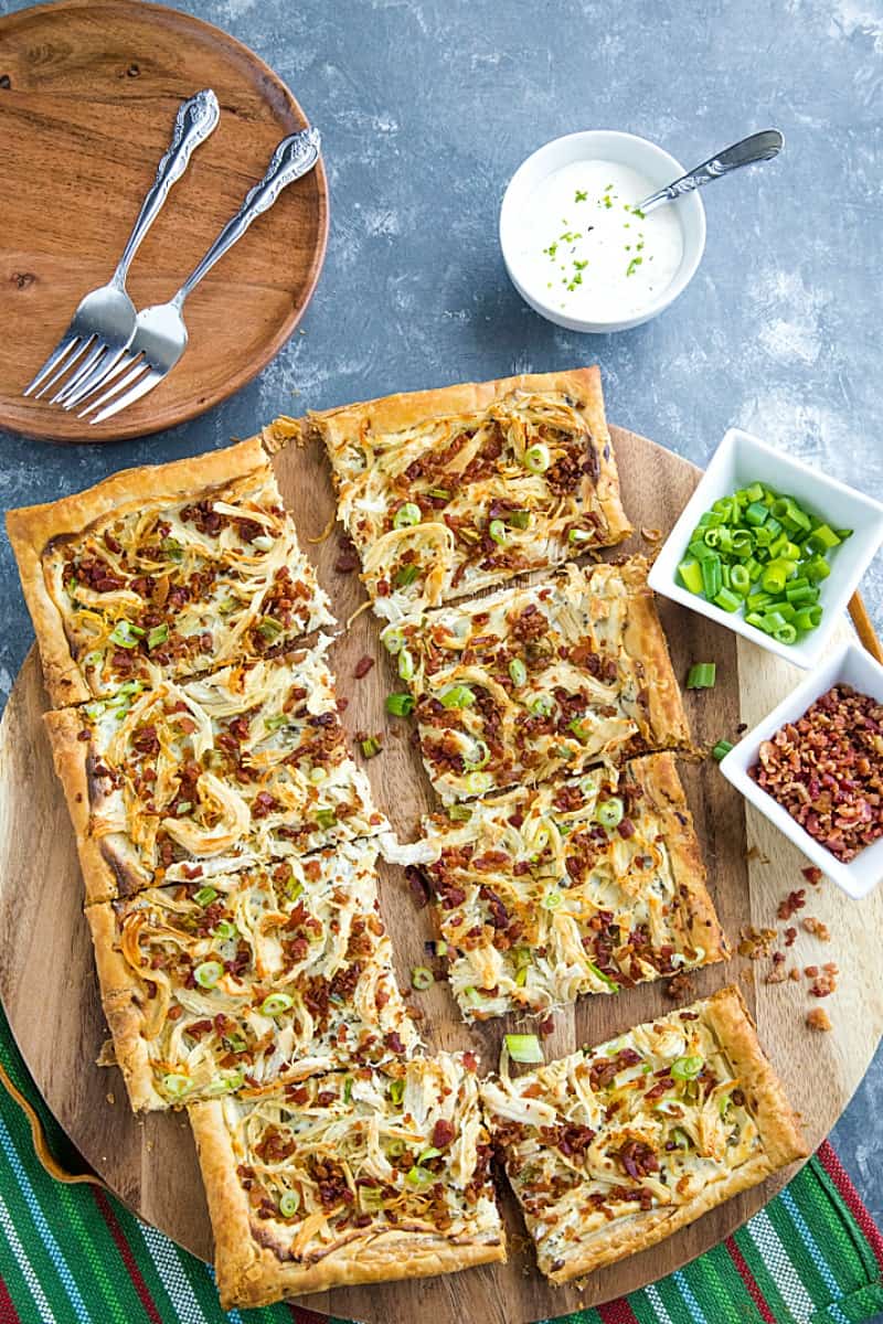 Shortcut ingredients like puff pastry, cooked chicken, chive cream cheese and bacon crumbles makes this Chicken Bacon Ranch Tart a quick and simple dinner favorite! #mustlovehomecooking