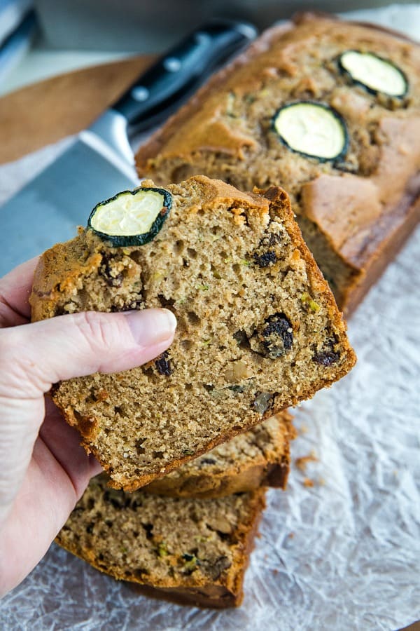 Super moist, buttery quick bread made with tangy sour cream and chock full of raisins, nuts and healthy shredded zucchini.#mustlovehomecooking