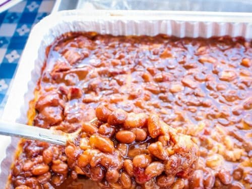 Grandma’s Real Southern Baked Beans is down home southern cooking at it’s best. Made with ingredients like bacon, roasted red pepper, molasses, brown sugar and cider vinegar, it's a family favorite! #mustlovehomecooking